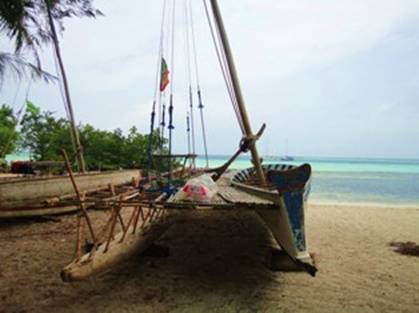 Sailing canoe ashore.jpg