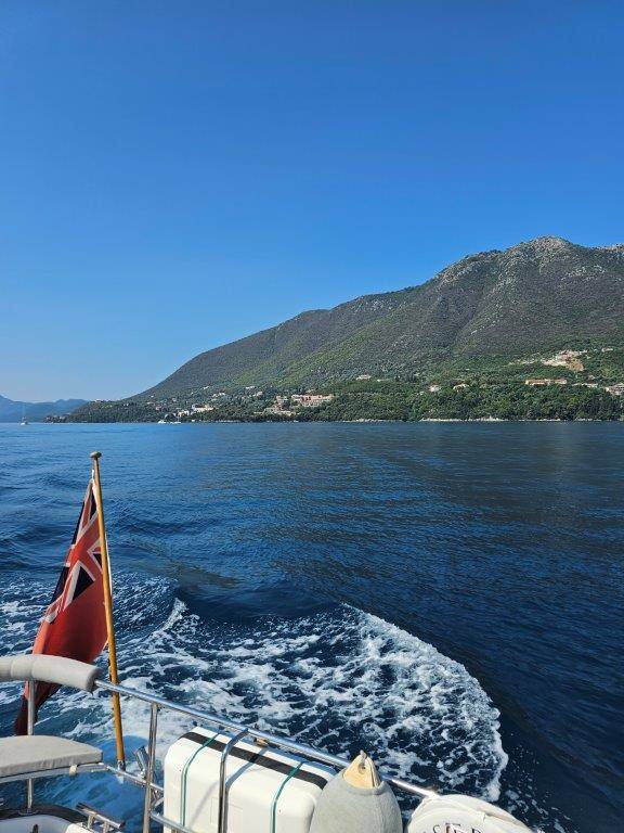 A picture containing outdoor, water, ship, lake

Description automatically generated