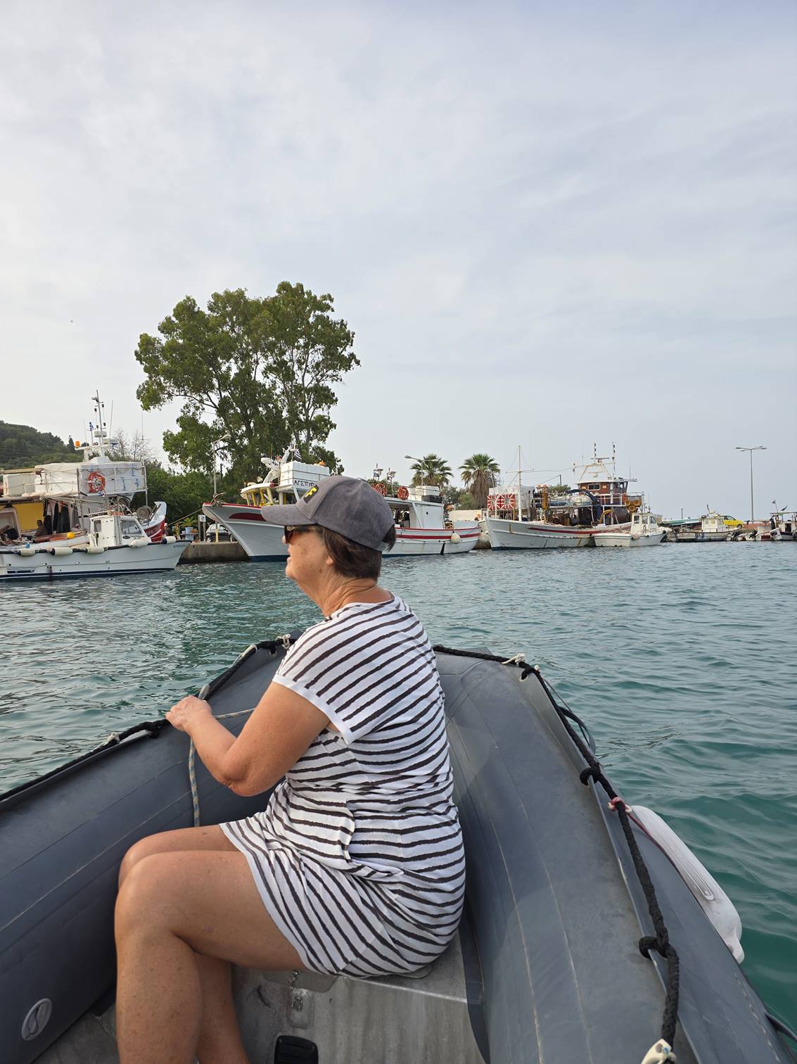 A person sitting on a boat

Description automatically generated