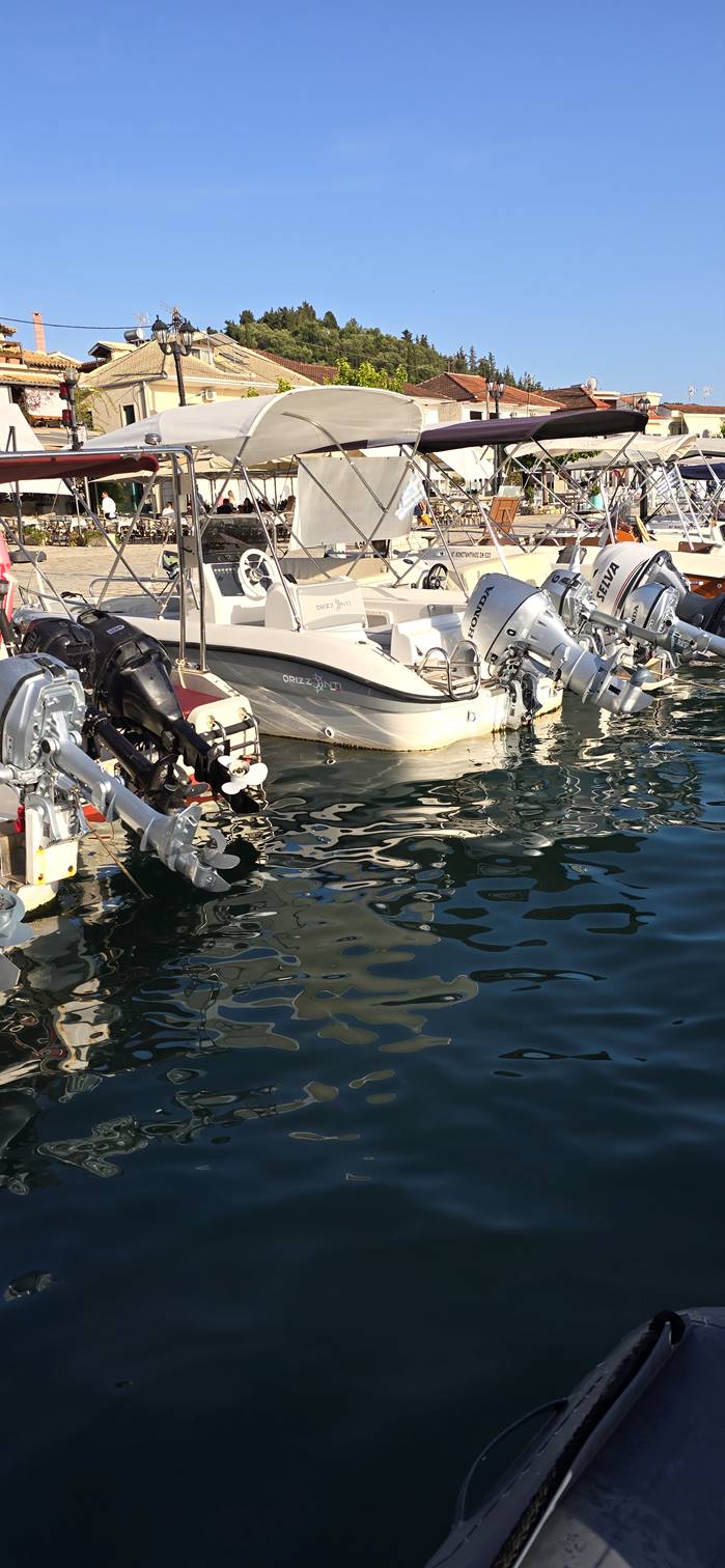A body of water with boats and boats on it

Description automatically generated