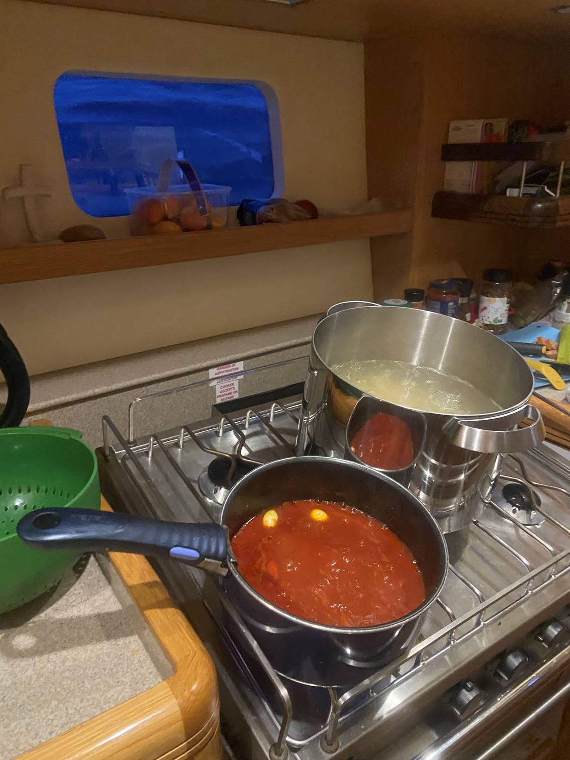 A pot of food on a stove

Description automatically generated
