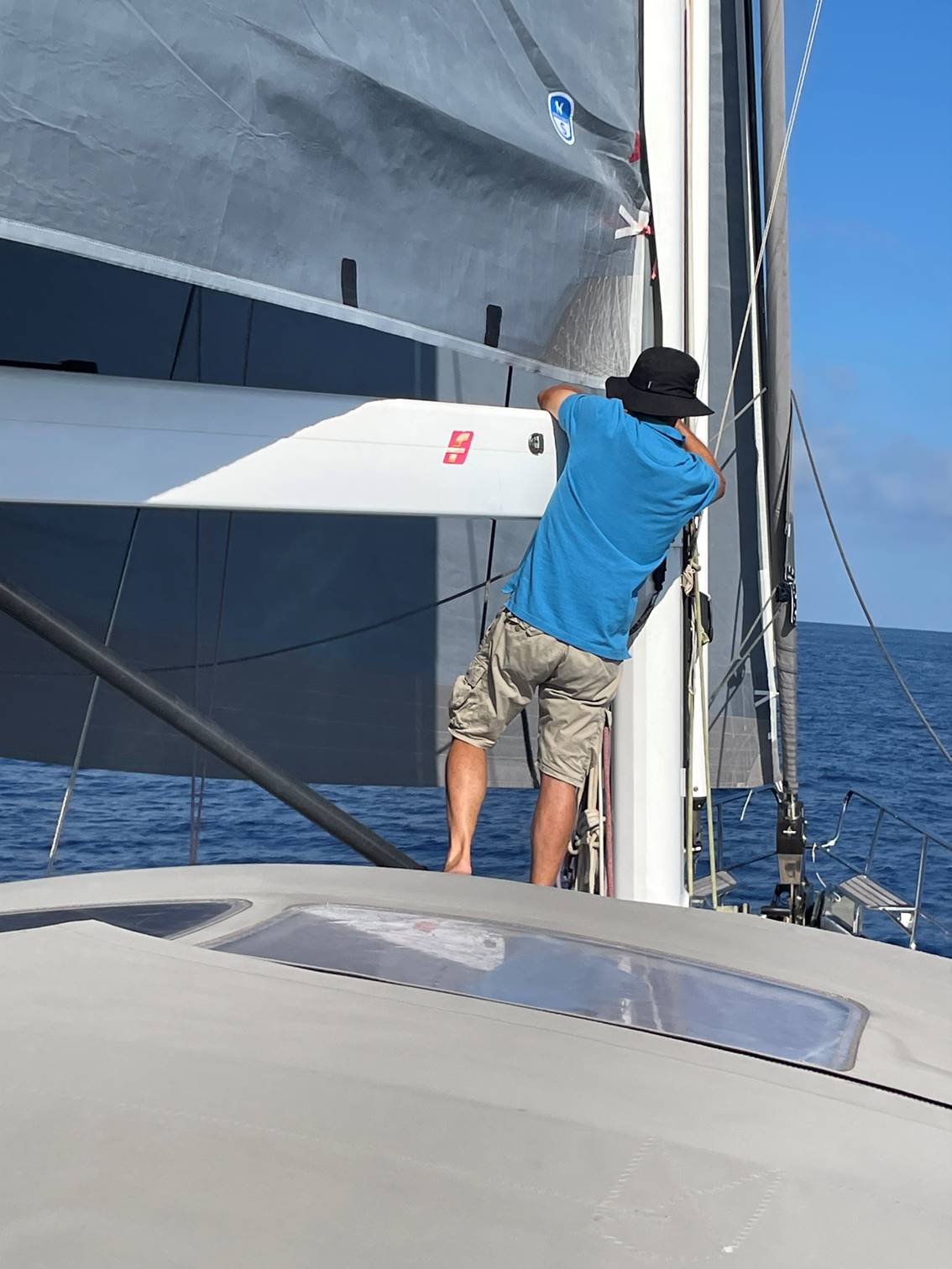 A person standing on a boat

Description automatically generated